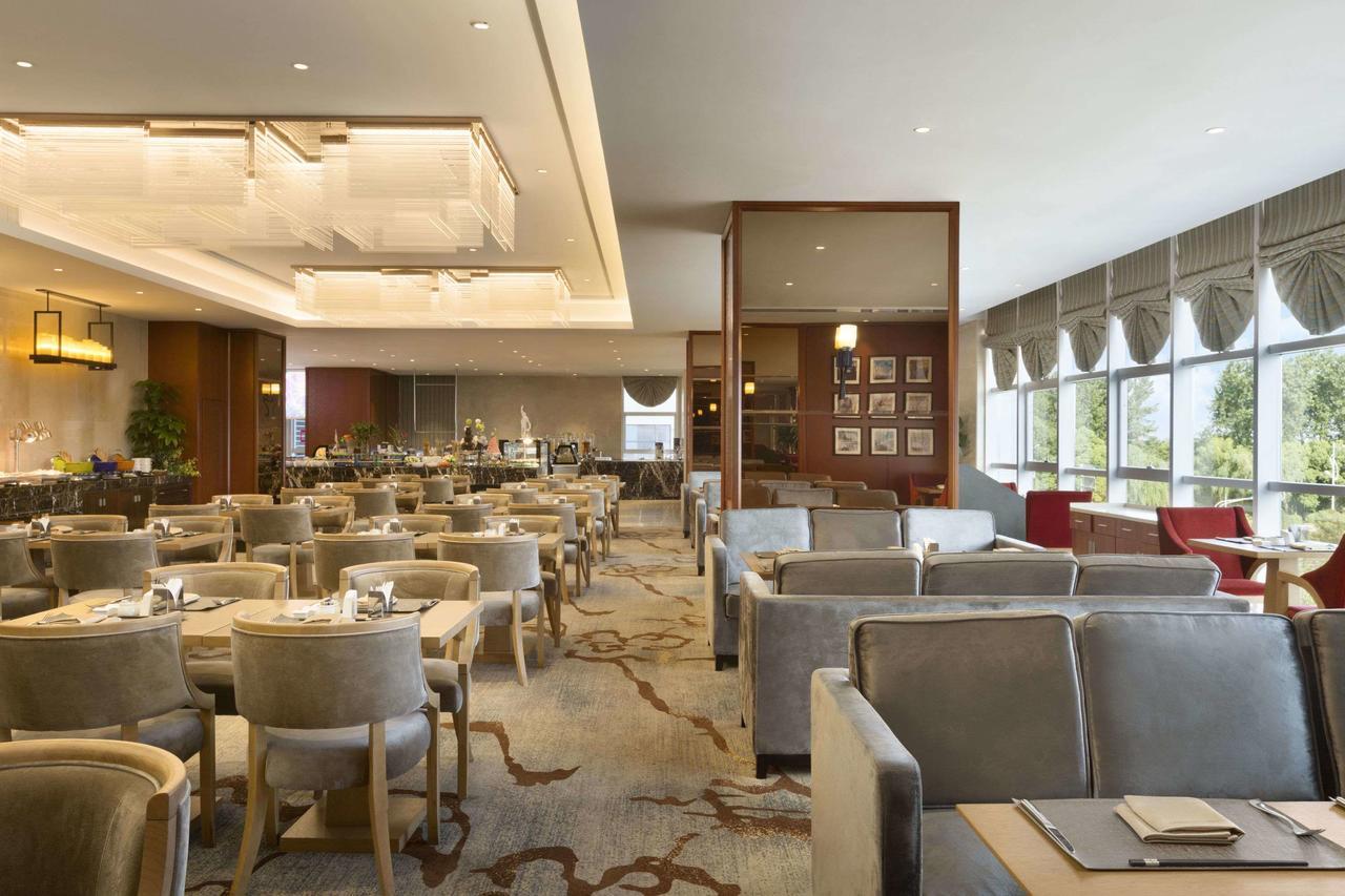 Hotel Ramada Jiaxing Esterno foto